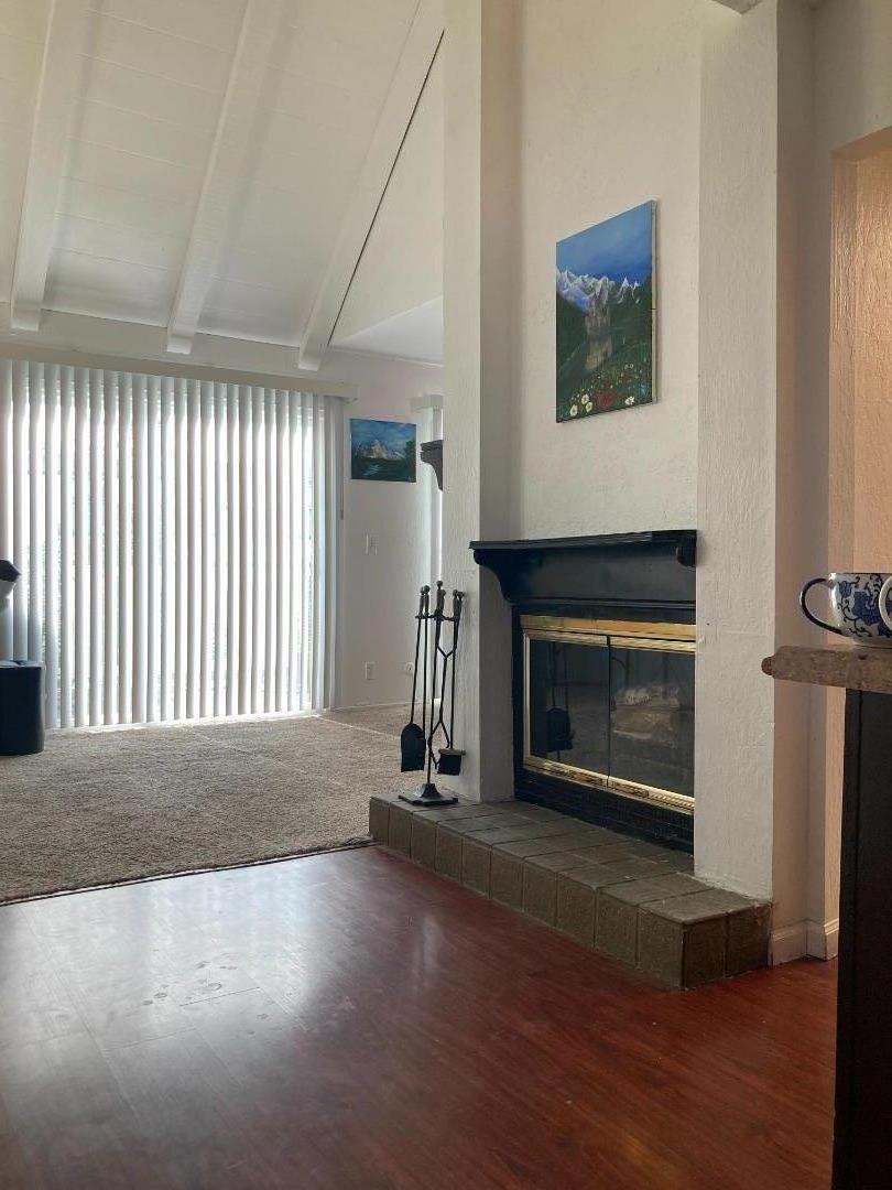 3660 Wells Road Oakley, CA 94561 - Photo 5 of 63 a view of empty room with fireplace and wooden floor