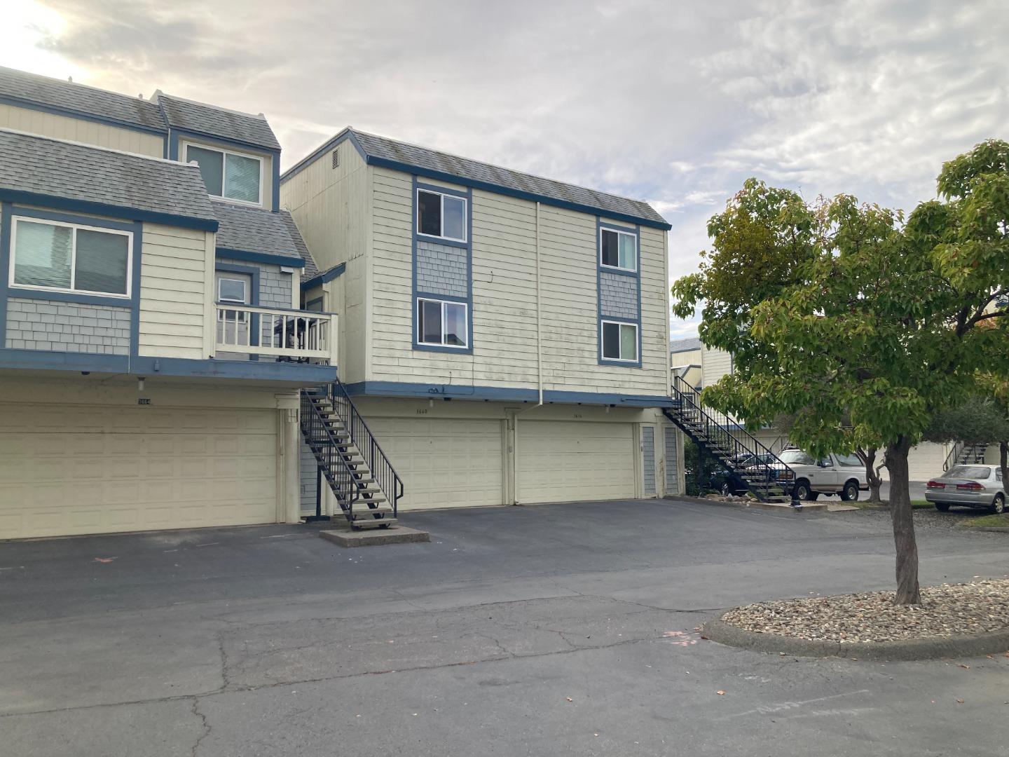 3660 Wells Road Oakley, CA 94561 - Photo 51 of 63 a view of a house with a parking space