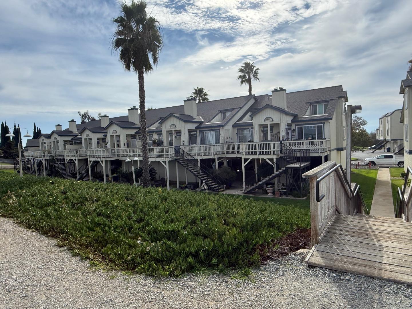 3660 Wells Road Oakley, CA 94561 - Photo 56 of 63 a front view of a house with a garden and yard