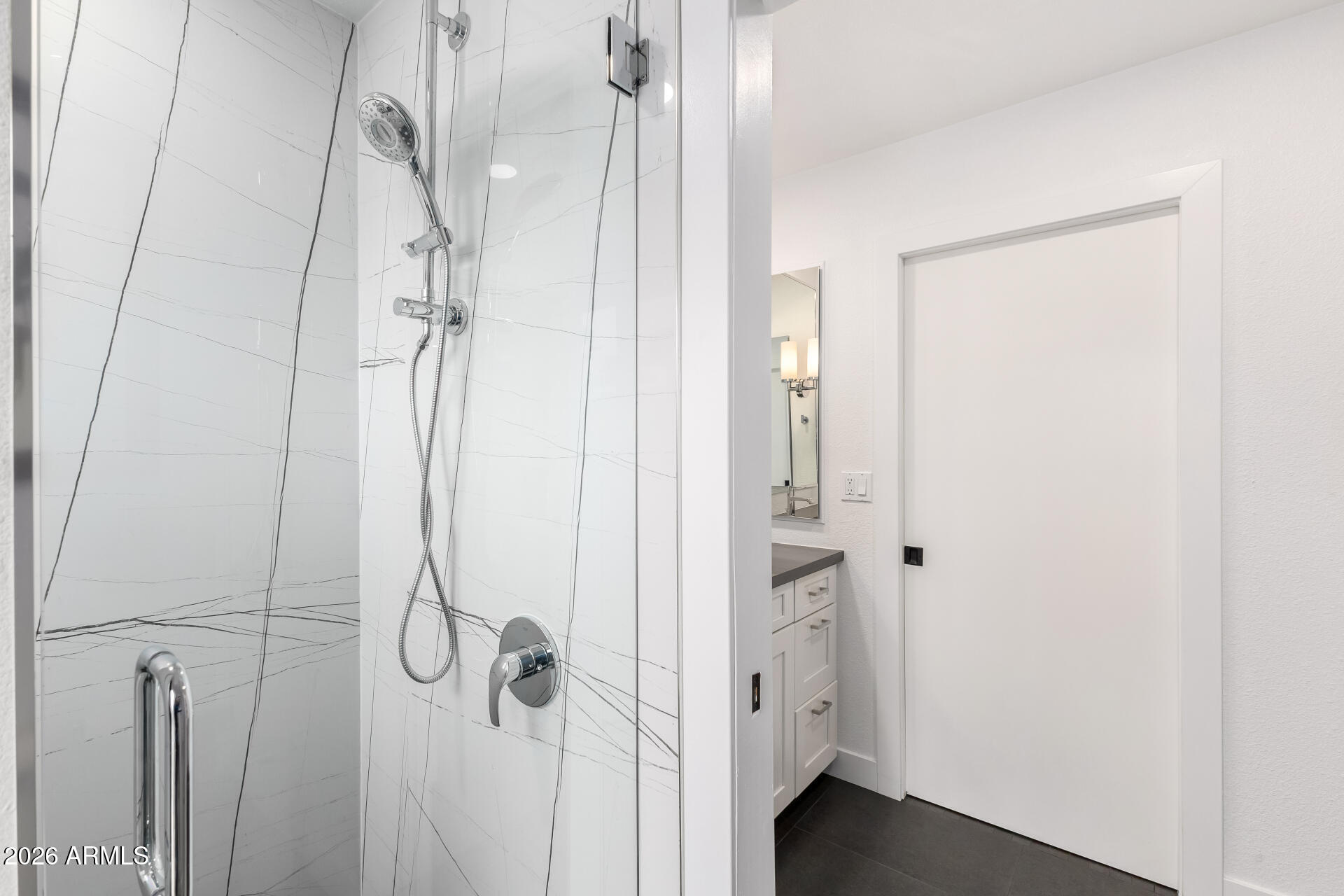 3220 East Hatcher Road Phoenix, AZ 85028 - Photo 23 of 50 a bathroom with a glass shower door