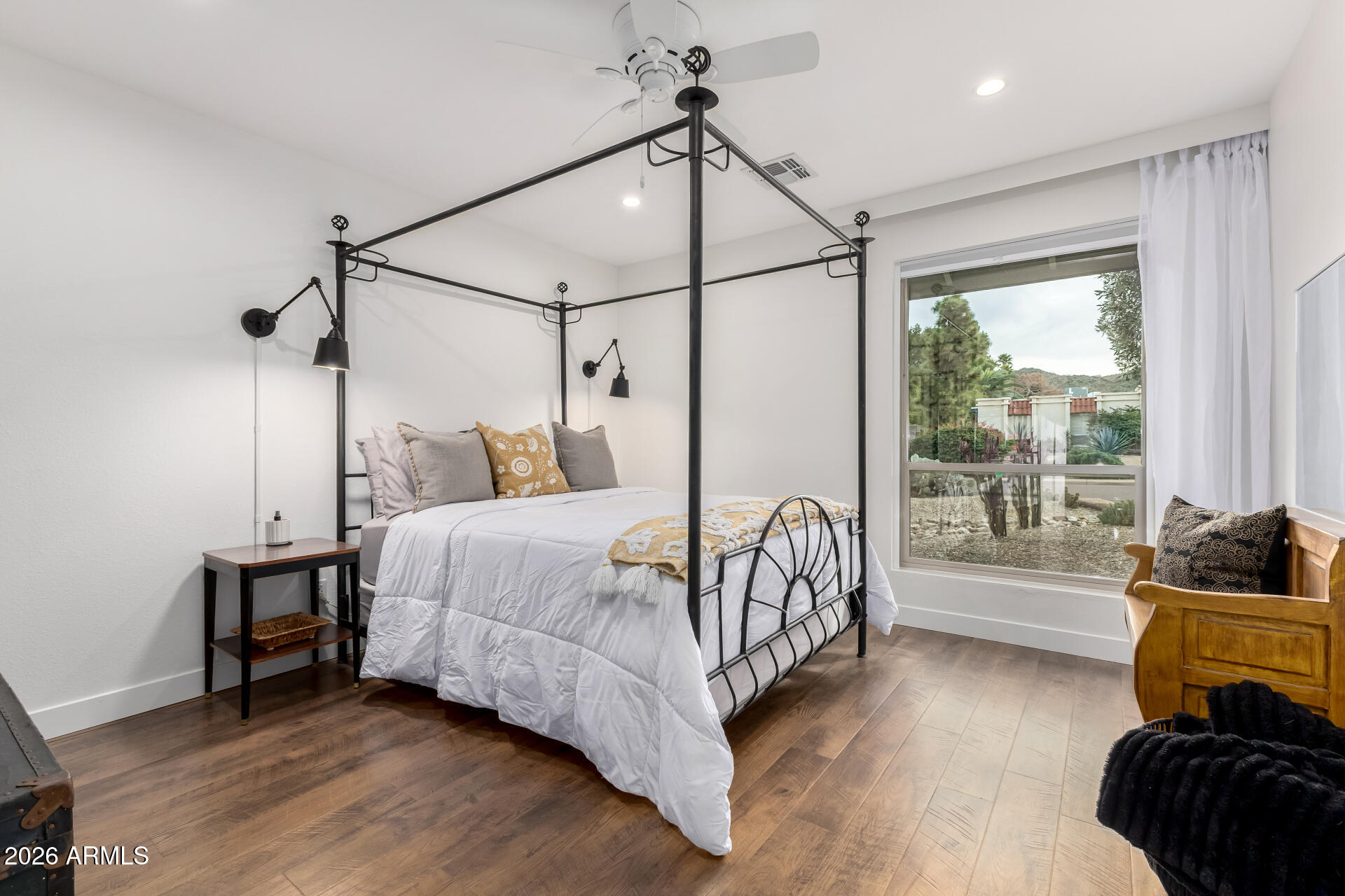3220 East Hatcher Road Phoenix, AZ 85028 - Photo 25 of 50 a bedroom with a bed and a window