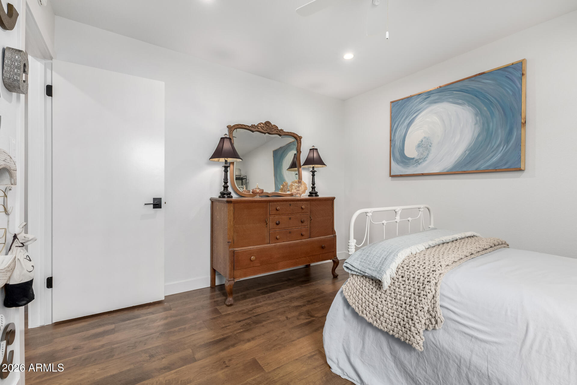3220 East Hatcher Road Phoenix, AZ 85028 - Photo 28 of 50 a bedroom with a bed and a dresser