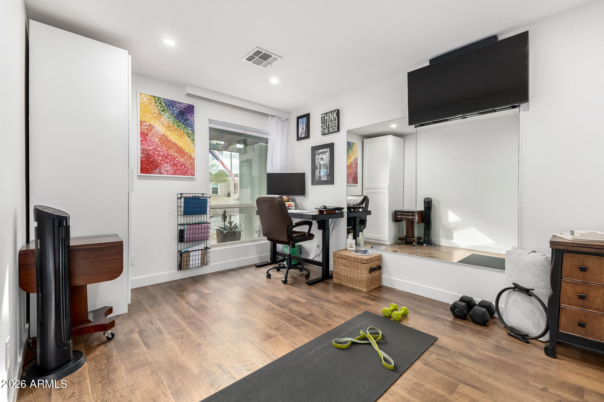 3220 East Hatcher Road Phoenix, AZ 85028 - Photo 30 of 50 a room with furniture a flat screen tv and a view of living room