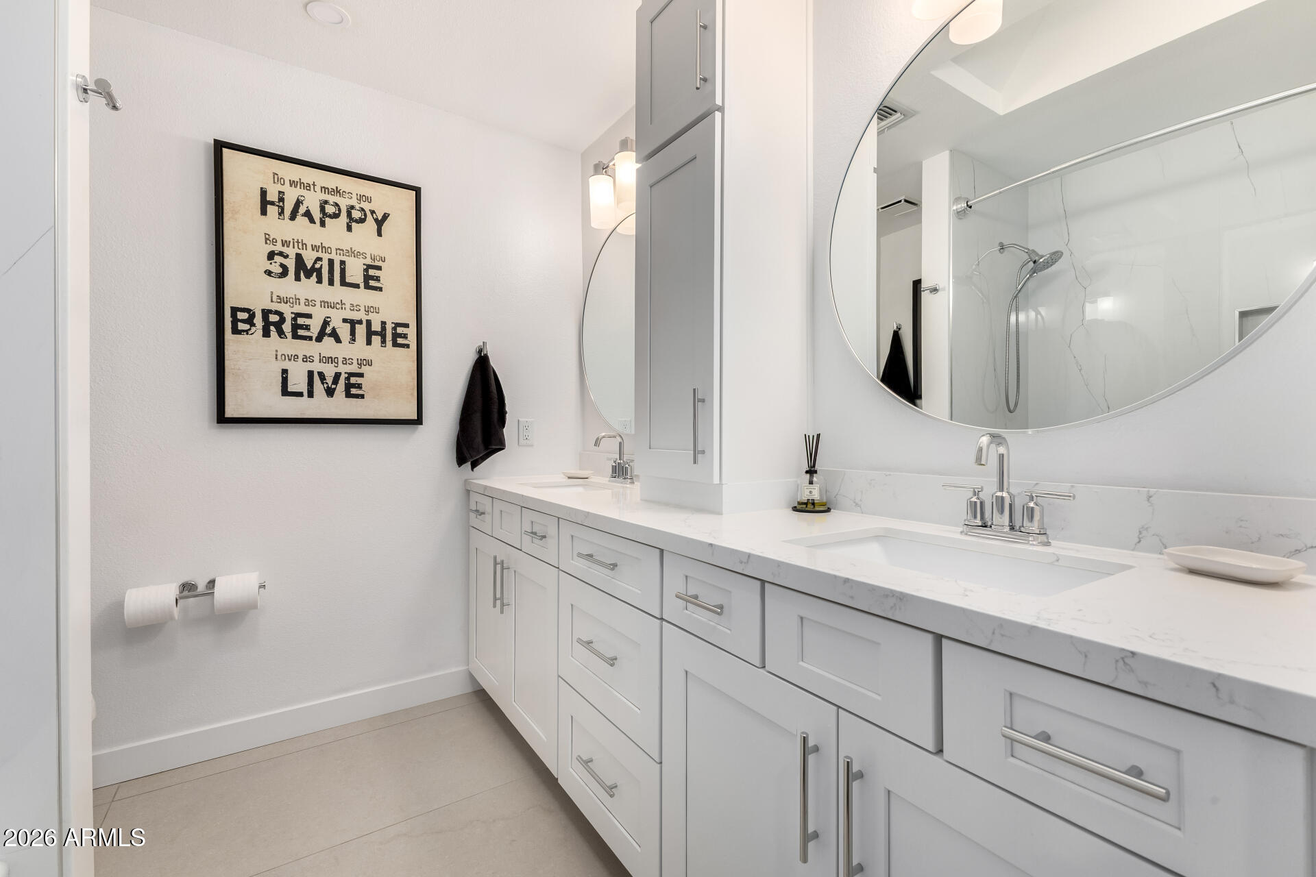 3220 East Hatcher Road Phoenix, AZ 85028 - Photo 31 of 50 a bathroom with a sink and a mirror