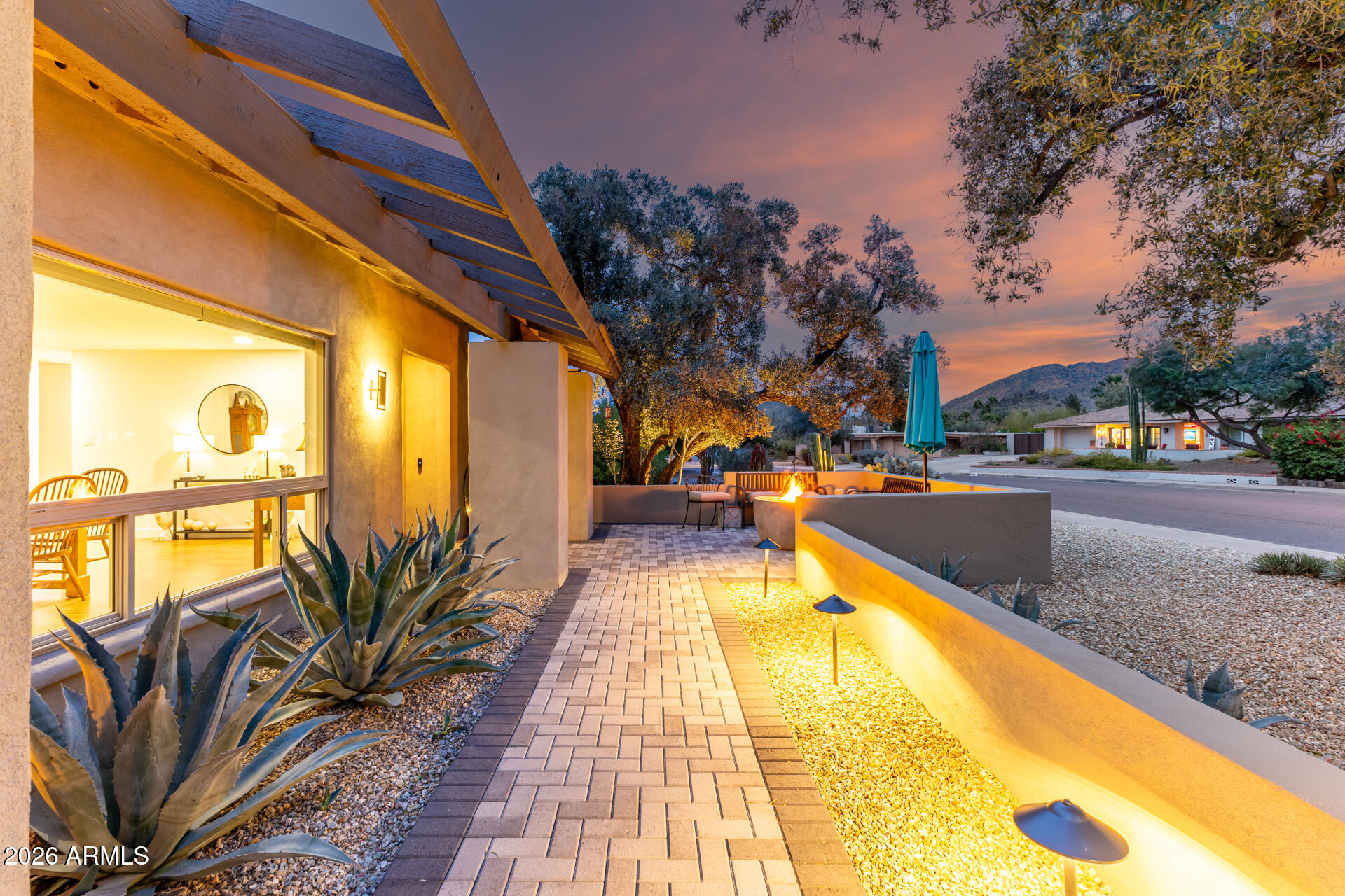 3220 East Hatcher Road Phoenix, AZ 85028 - Photo 4 of 50 a swimming pool with yard and outdoor seating