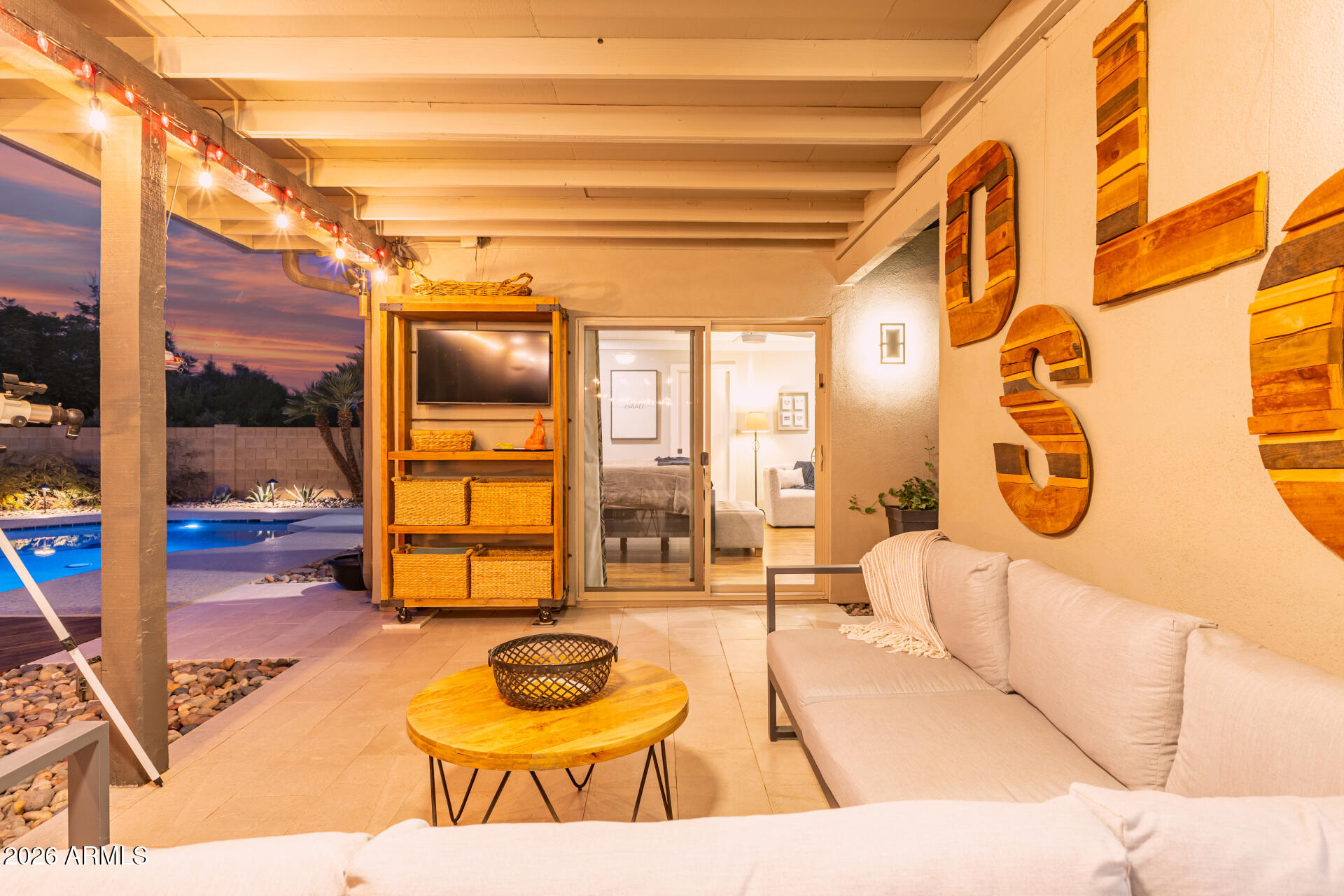 3220 East Hatcher Road Phoenix, AZ 85028 - Photo 45 of 50 a living room with furniture and a floor to ceiling window