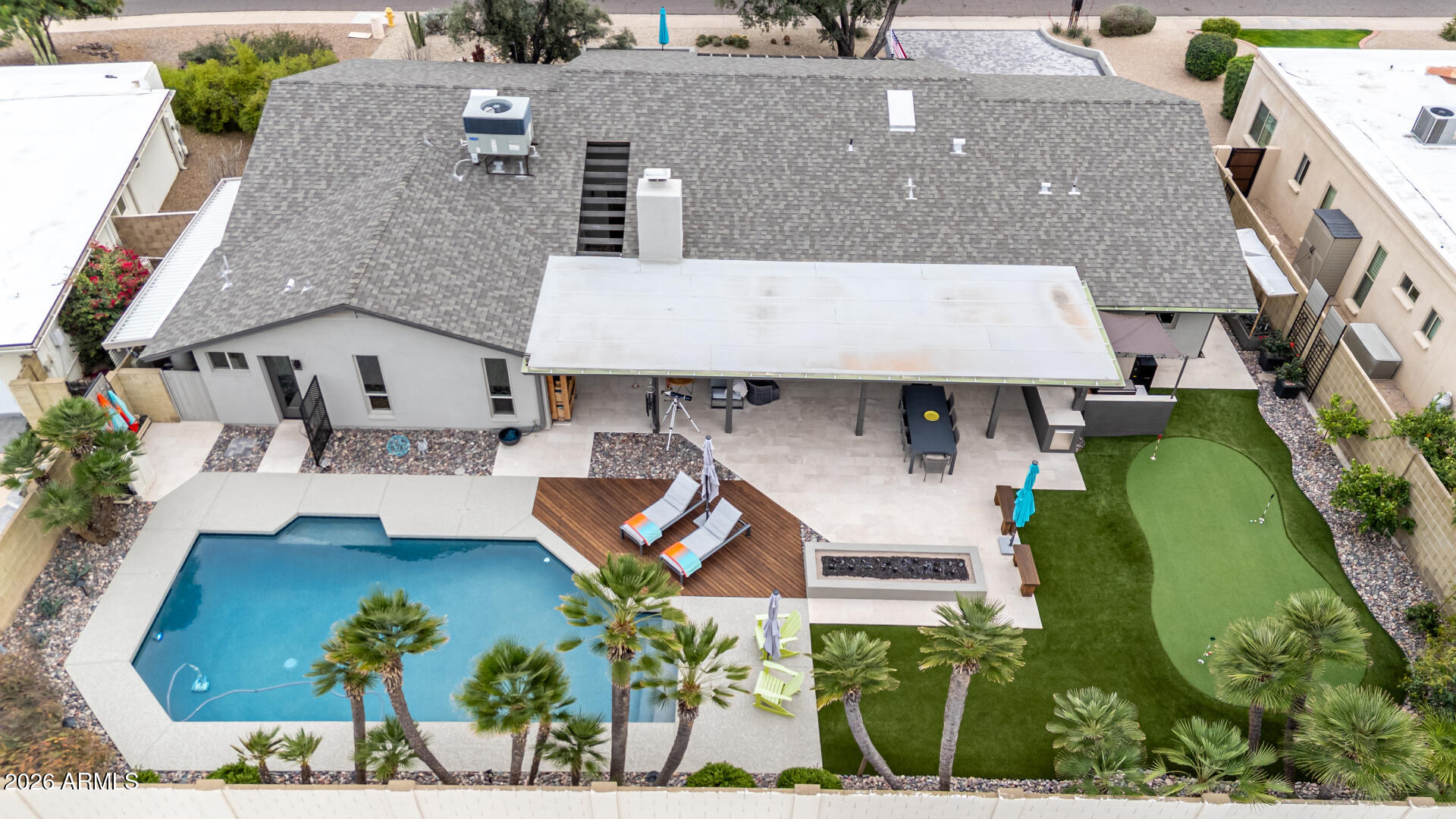 3220 East Hatcher Road Phoenix, AZ 85028 - Photo 8 of 50 an aerial view of a house with garden space ocean and trees