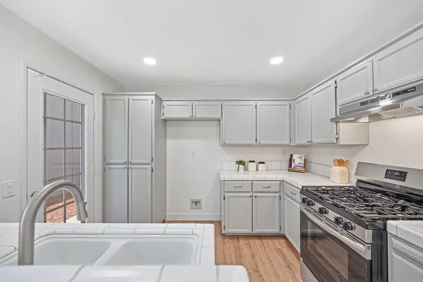 a bedroom with a bed and a view of bedroom