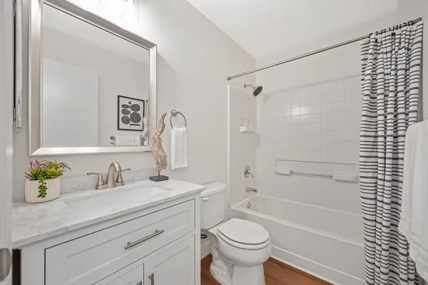 a house that has tree in front of it