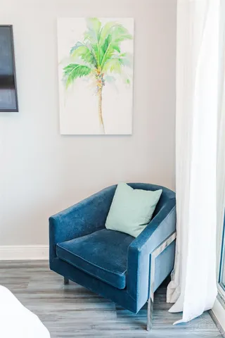 a view of front door with wooden floor