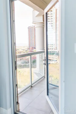 a view of living room with furniture and a fireplace