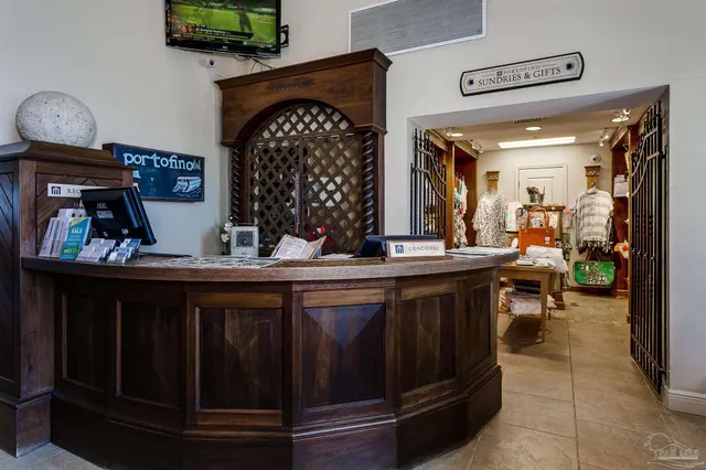 a view of a livingroom with furniture window and a patio