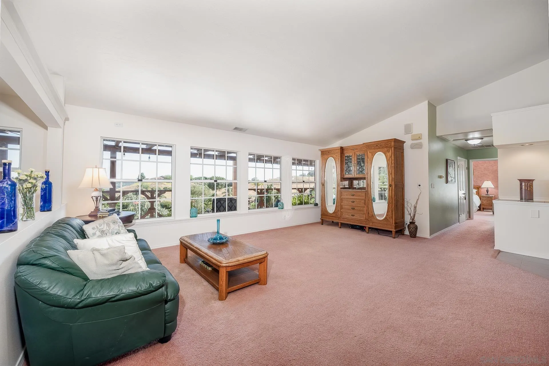 4241 Via El Dorado Fallbrook, CA 92028 - Photo 18 of 64 a living room with furniture and a flat screen tv