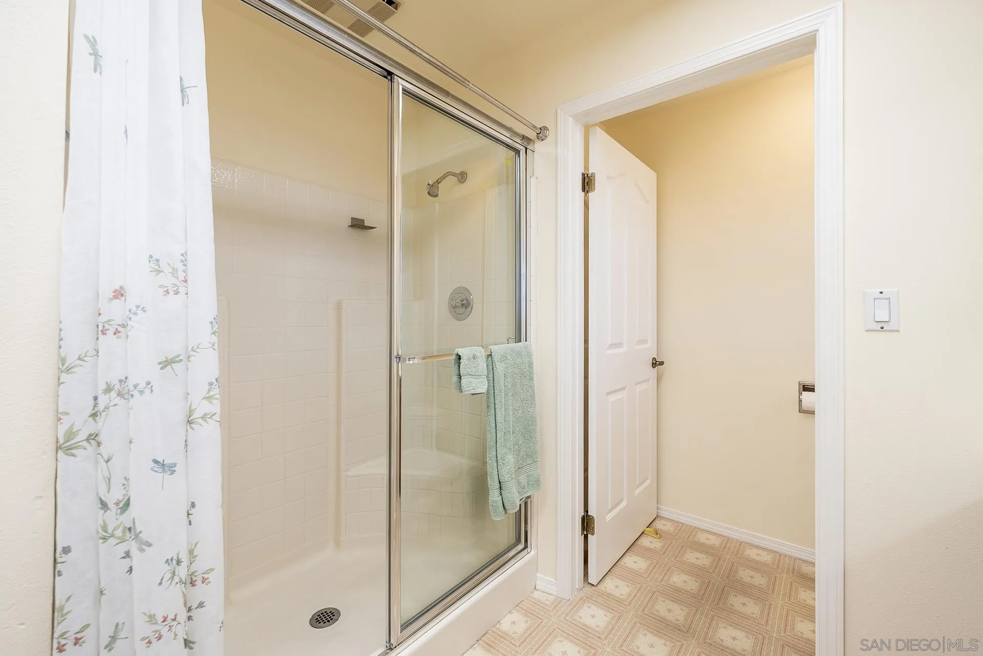 4241 Via El Dorado Fallbrook, CA 92028 - Photo 26 of 64 a bathroom with a glass shower door