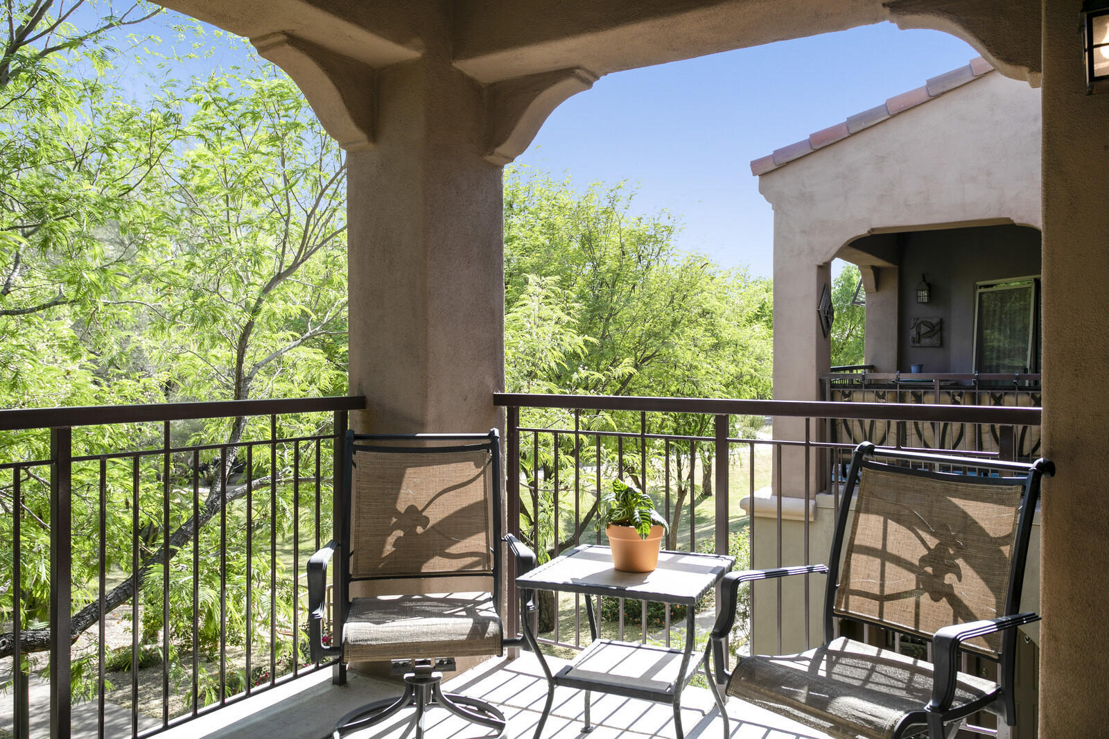 3935 East Rough Rider Road, Unit 1360 Phoenix, AZ 85050 - Photo 12 of 47 Corner covered balcony with a view