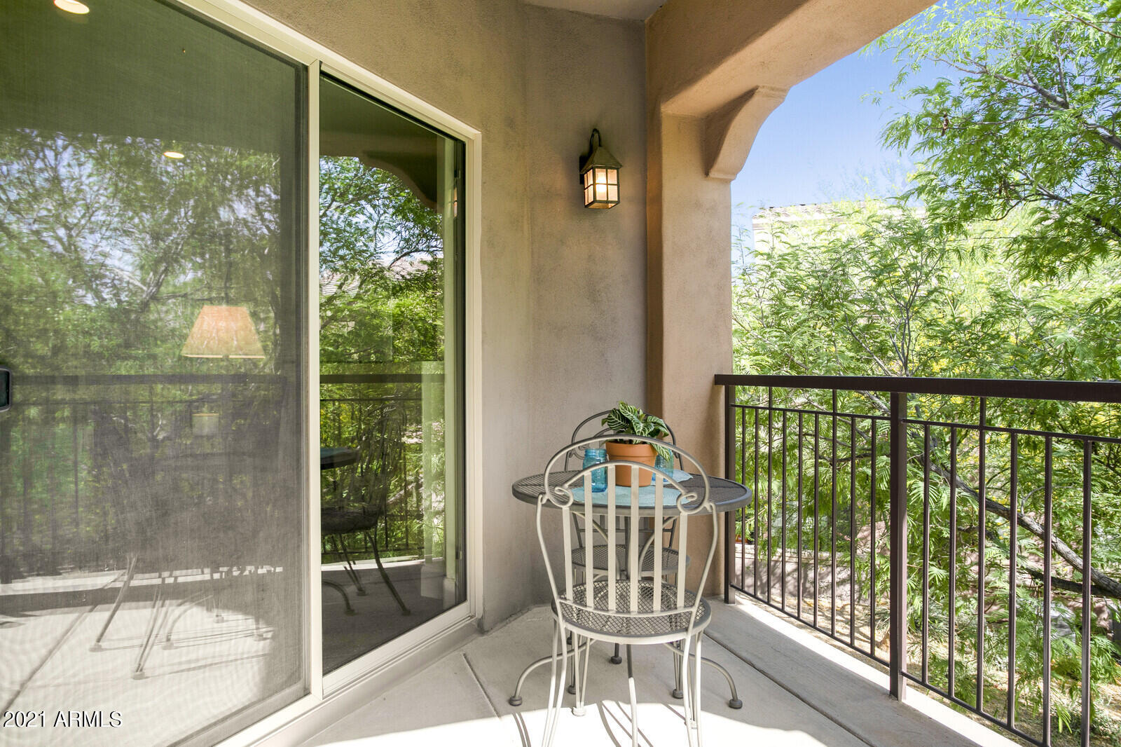 3935 East Rough Rider Road, Unit 1360 Phoenix, AZ 85050 - Photo 13 of 47 Access patio from gr rm & mstr