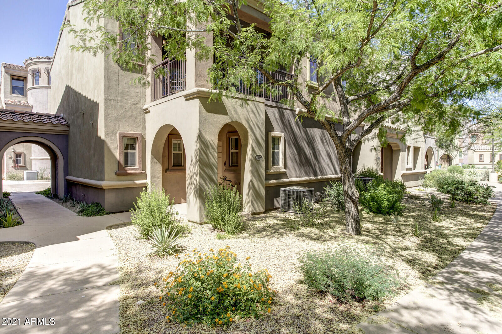 3935 East Rough Rider Road, Unit 1360 Phoenix, AZ 85050 - Photo 6 of 47 Corner unit with lush landscaping