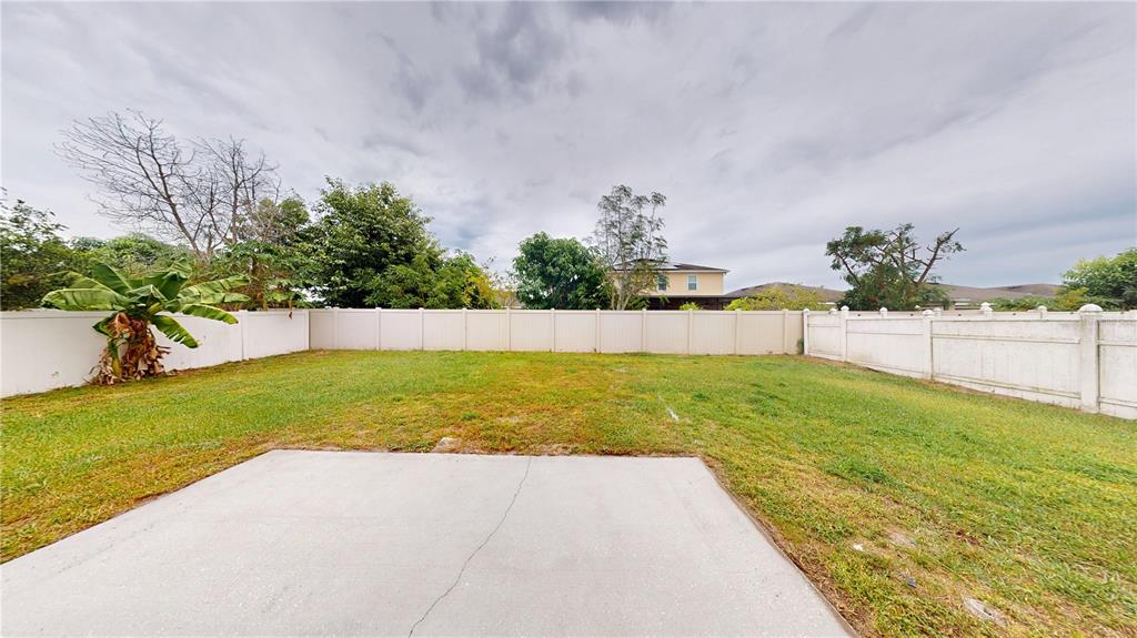 3209 Murray Hill Loop Kissimmee, FL 34758 - Photo 21 of 23 a view of swimming pool with a yard