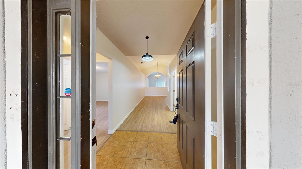3209 Murray Hill Loop Kissimmee, FL 34758 - Photo 3 of 23 a view of entryway