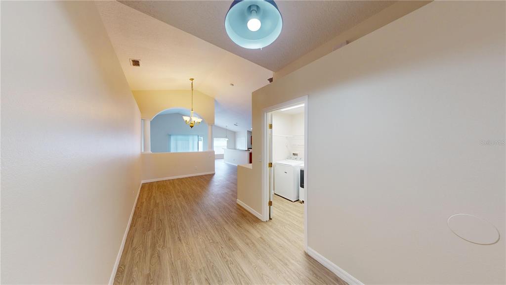 3209 Murray Hill Loop Kissimmee, FL 34758 - Photo 9 of 23 a view of a livingroom with wooden floor