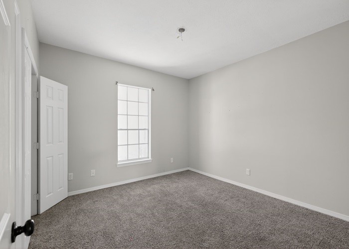 406 Spring Lakes Haven Spring, TX 77373 - Photo 14 of 24 an empty room with windows