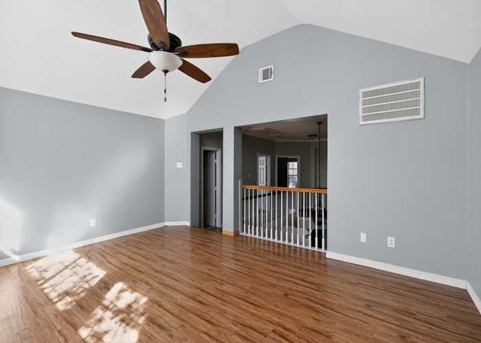 406 Spring Lakes Haven Spring, TX 77373 - Photo 18 of 24 a view of a livingroom with a ceiling fan and wooden floor
