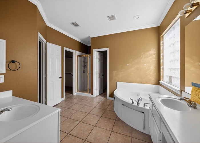 406 Spring Lakes Haven Spring, TX 77373 - Photo 23 of 24 a bathroom with a tub sink and mirror