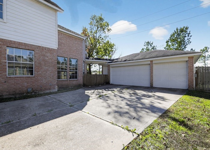 406 Spring Lakes Haven Spring, TX 77373 - Photo 4 of 24 a view of entrance gate of the house