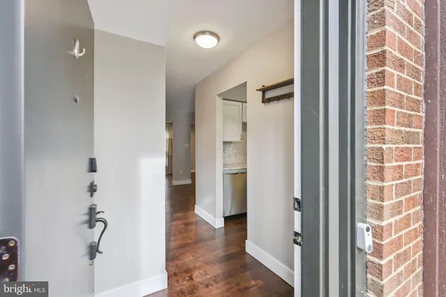 a view of bathroom with a shower and a sink