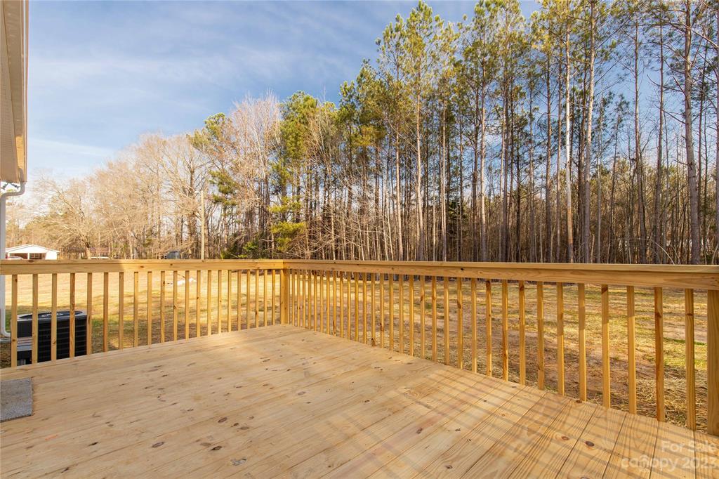 6724 State Rd S-29-555 Kershaw, SC 29067 - Photo 24 of 31 a view of wooden balcony