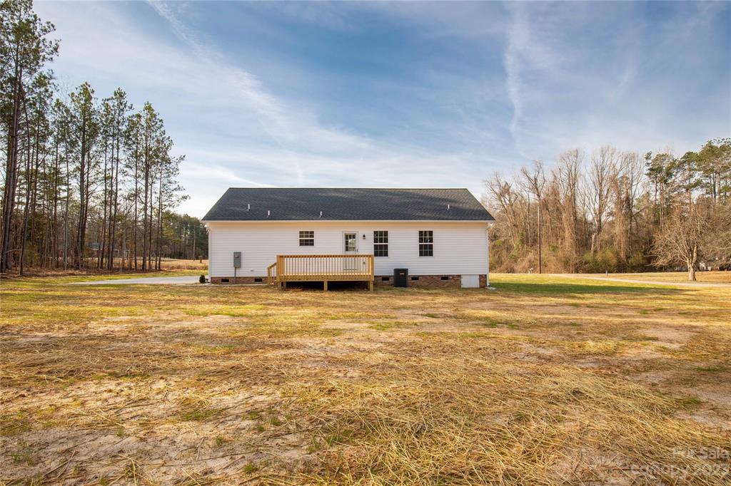 6724 State Rd S-29-555 Kershaw, SC 29067 - Photo 25 of 31 a house view with swimming pool in front of it