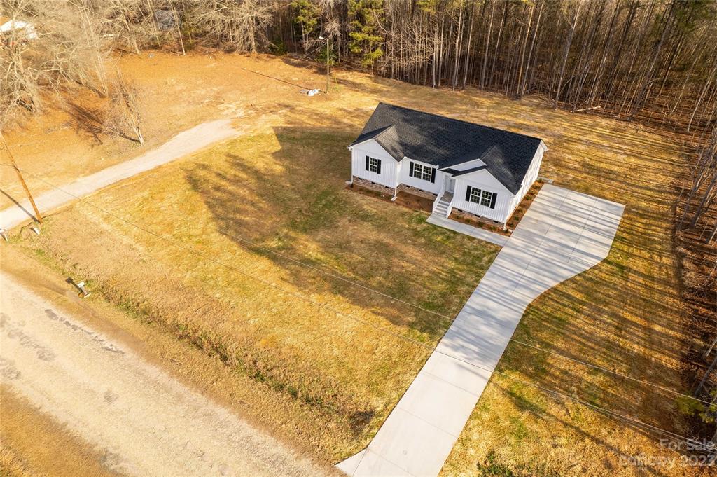 6724 State Rd S-29-555 Kershaw, SC 29067 - Photo 27 of 31 a roof deck with a yard