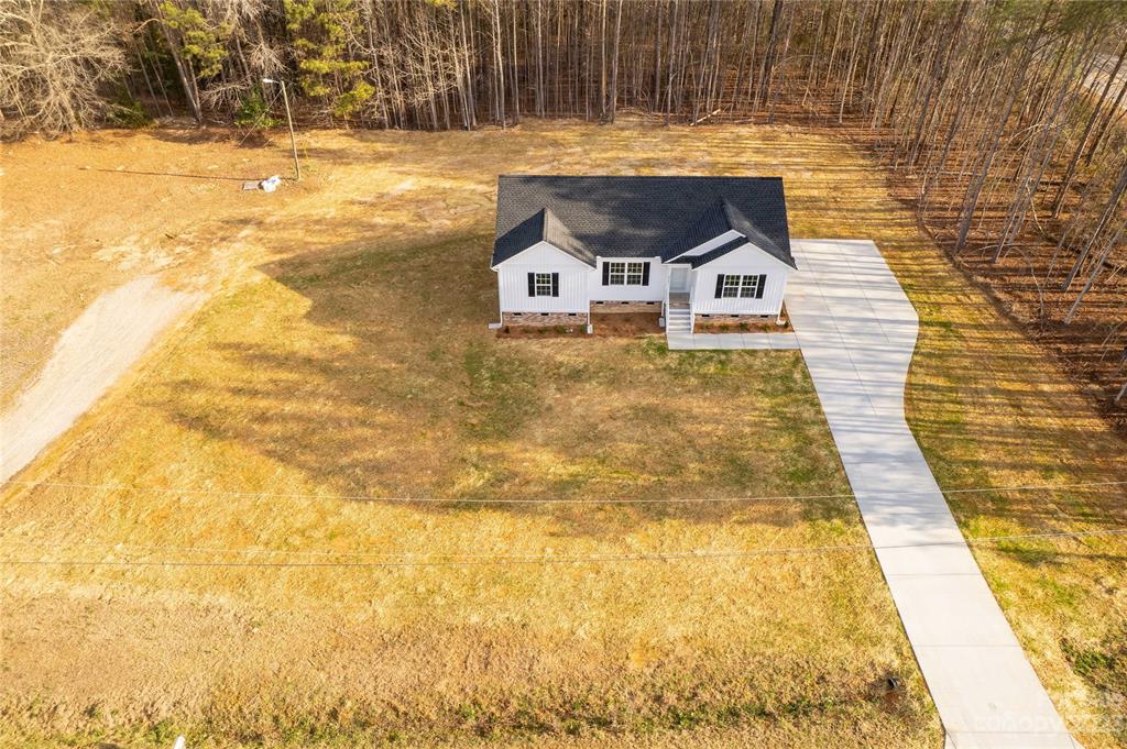 6724 State Rd S-29-555 Kershaw, SC 29067 - Photo 31 of 31 a house view with swimming pool in the back