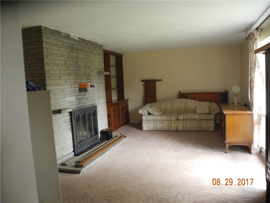 1409 Reissing Road McDonald, PA 15057 - Photo 5 of 21 large livingroom with gas fireplace