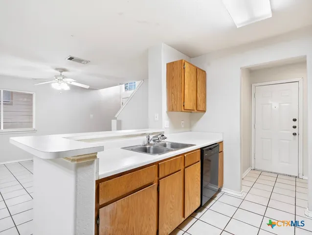 a bathroom with a sink a vanity and a mirror