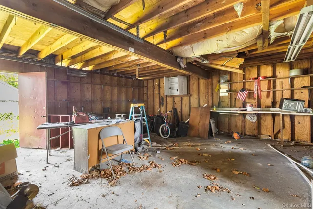 a view of a chairs and table in the patio