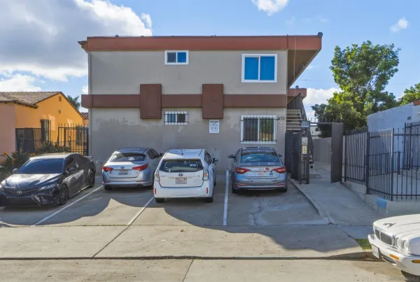 a car parked in front of a house