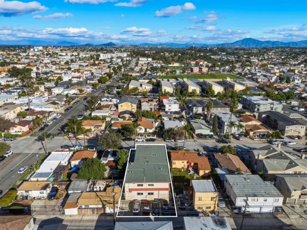 an aerial view of residential building with parking space