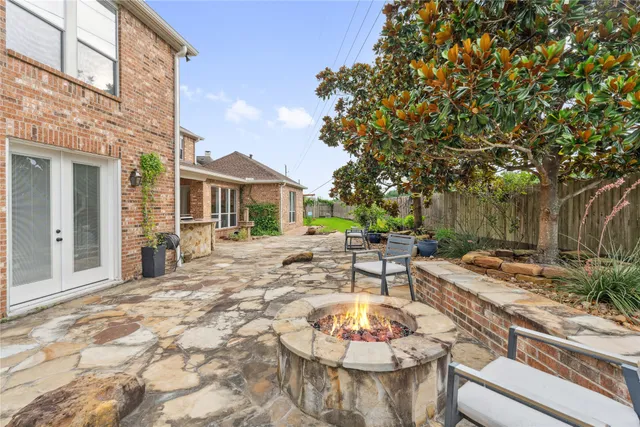 a kitchen with a sink and a stove