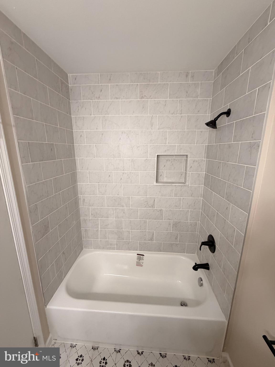 21184 Colton Point Road Avenue, MD 20609 - Photo 15 of 20 a bathroom with a bathtub