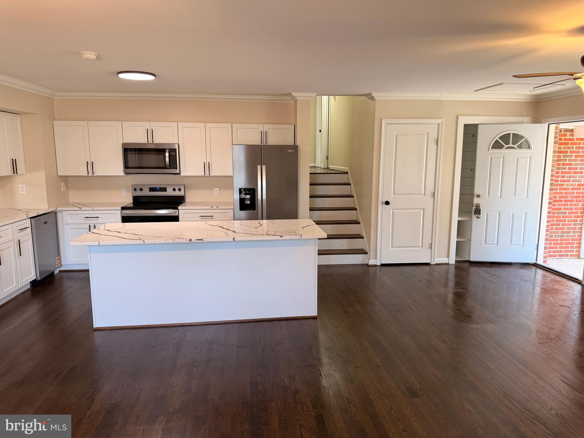 21184 Colton Point Road Avenue, MD 20609 - Photo 2 of 20 a large kitchen with stainless steel appliances