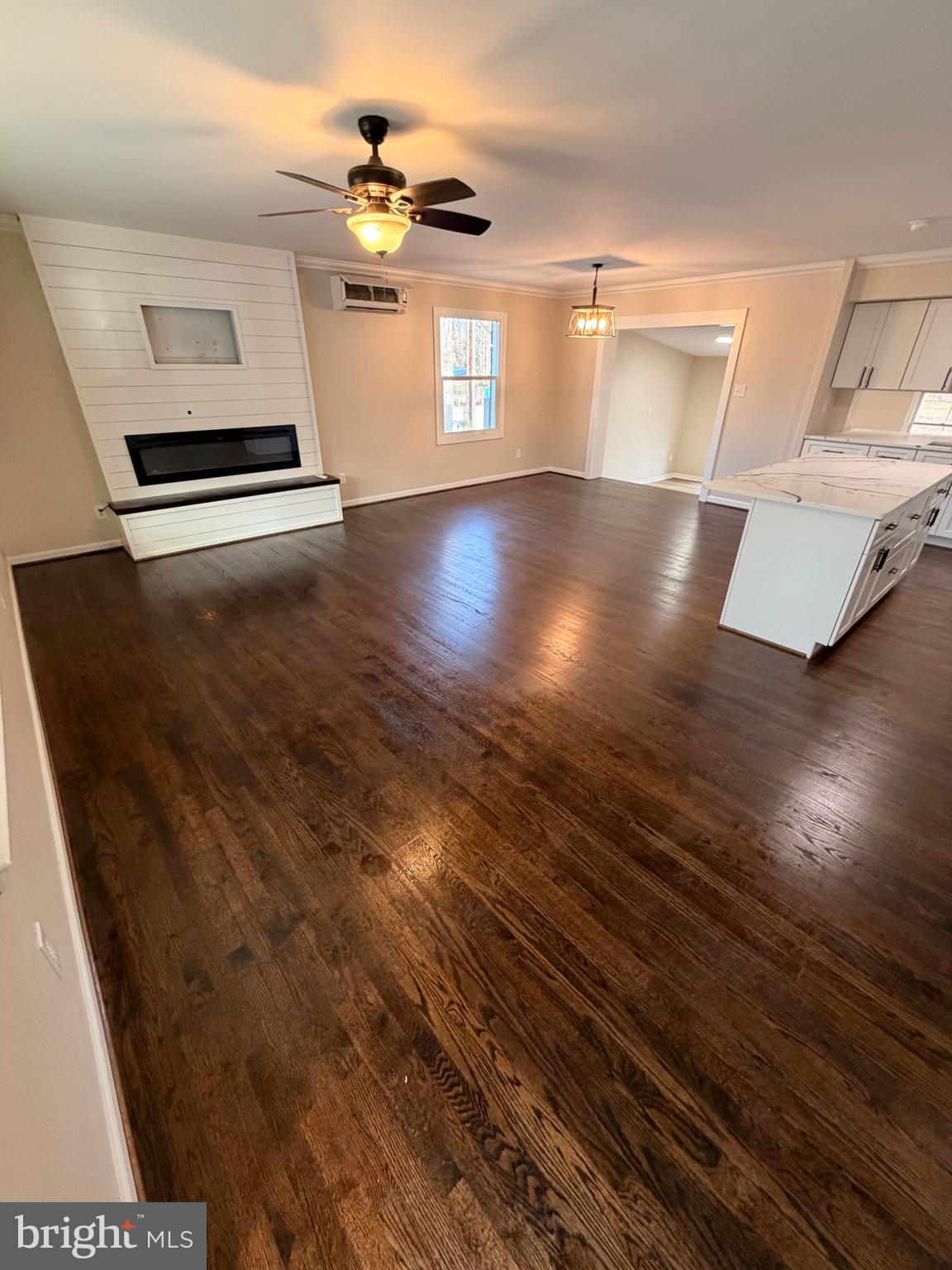 21184 Colton Point Road Avenue, MD 20609 - Photo 4 of 20 wooden floor in an empty room with a window