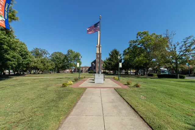 a view of swimming pool with a yard