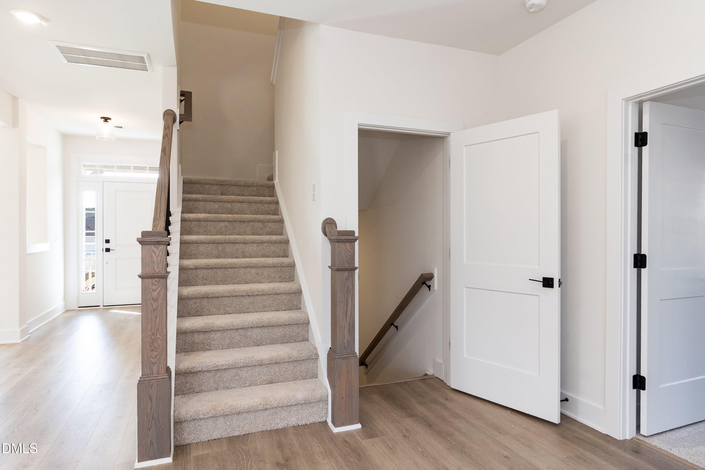 42 Braddock Court Garner, NC 27529 - Photo 26 of 56 a view of an entryway with staircase