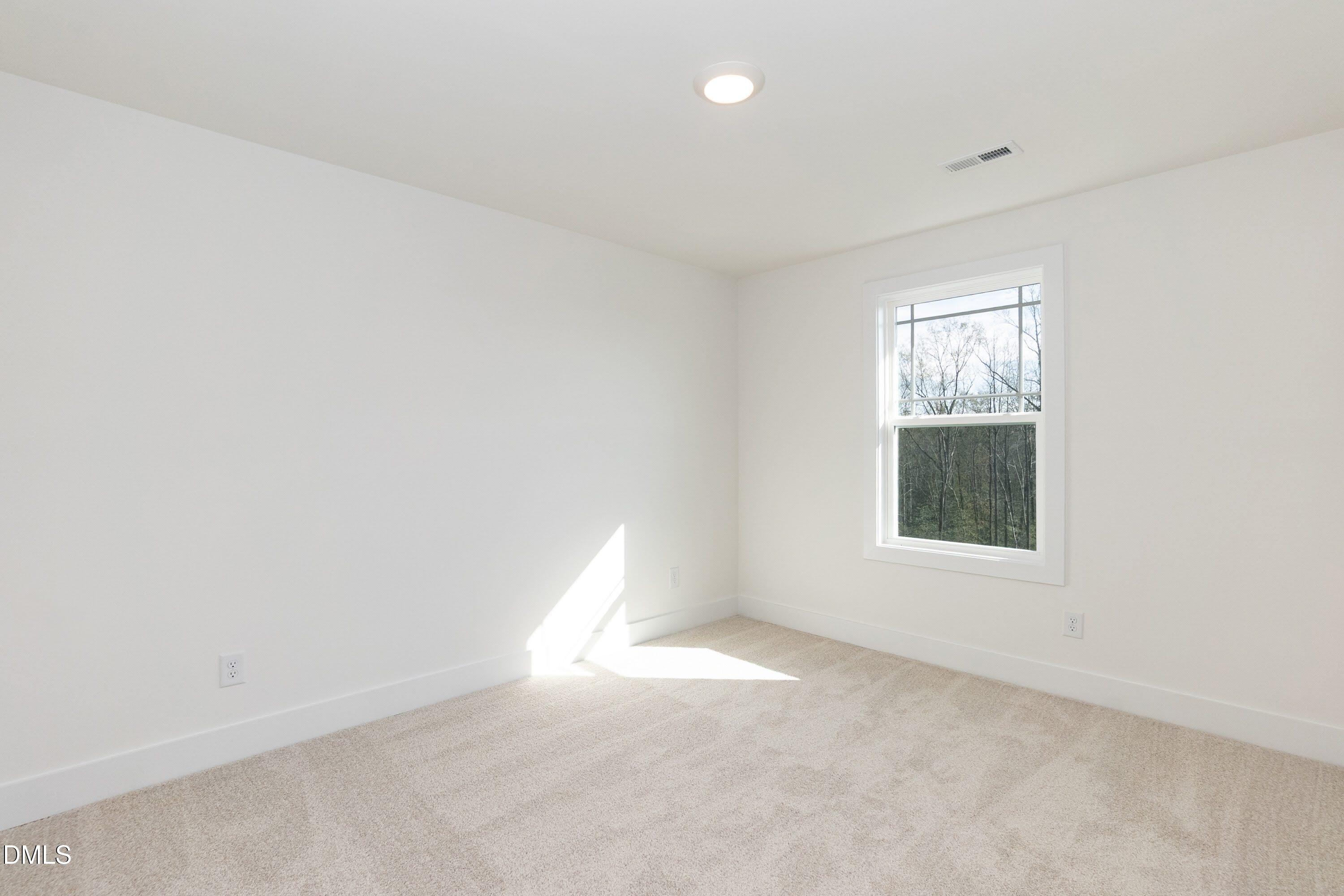 42 Braddock Court Garner, NC 27529 - Photo 30 of 56 an empty room with a window