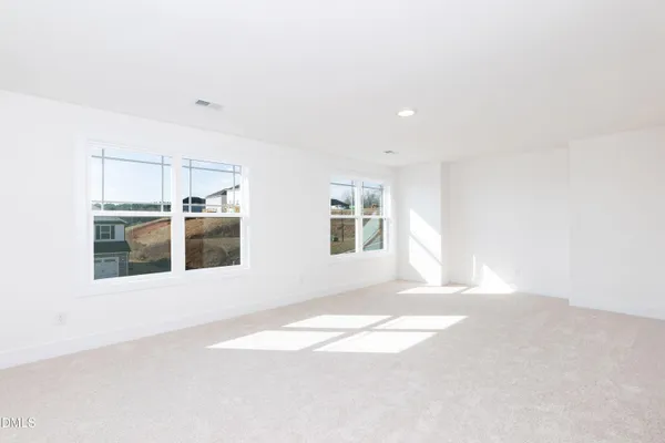 an empty room with an entryway