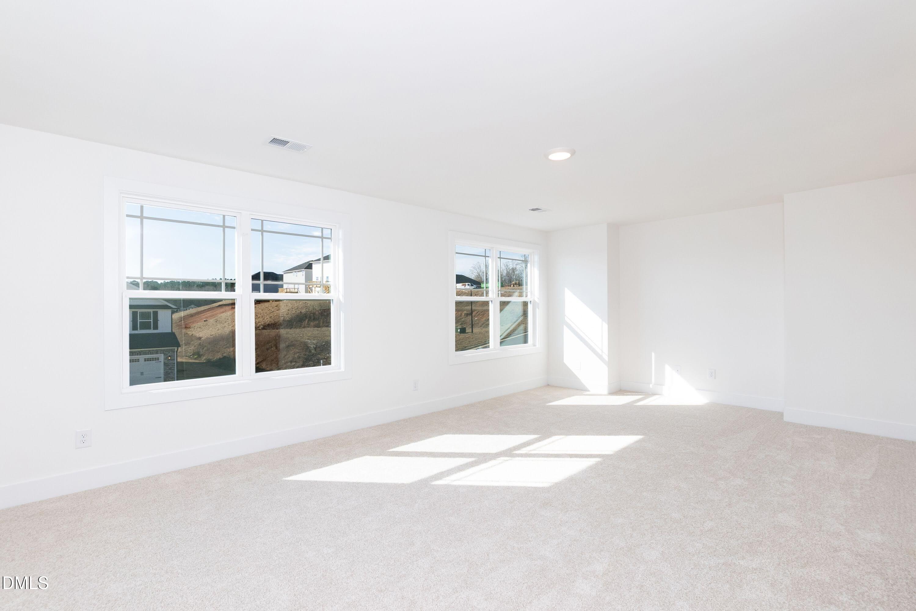 42 Braddock Court Garner, NC 27529 - Photo 35 of 56 a view of an empty room with a window