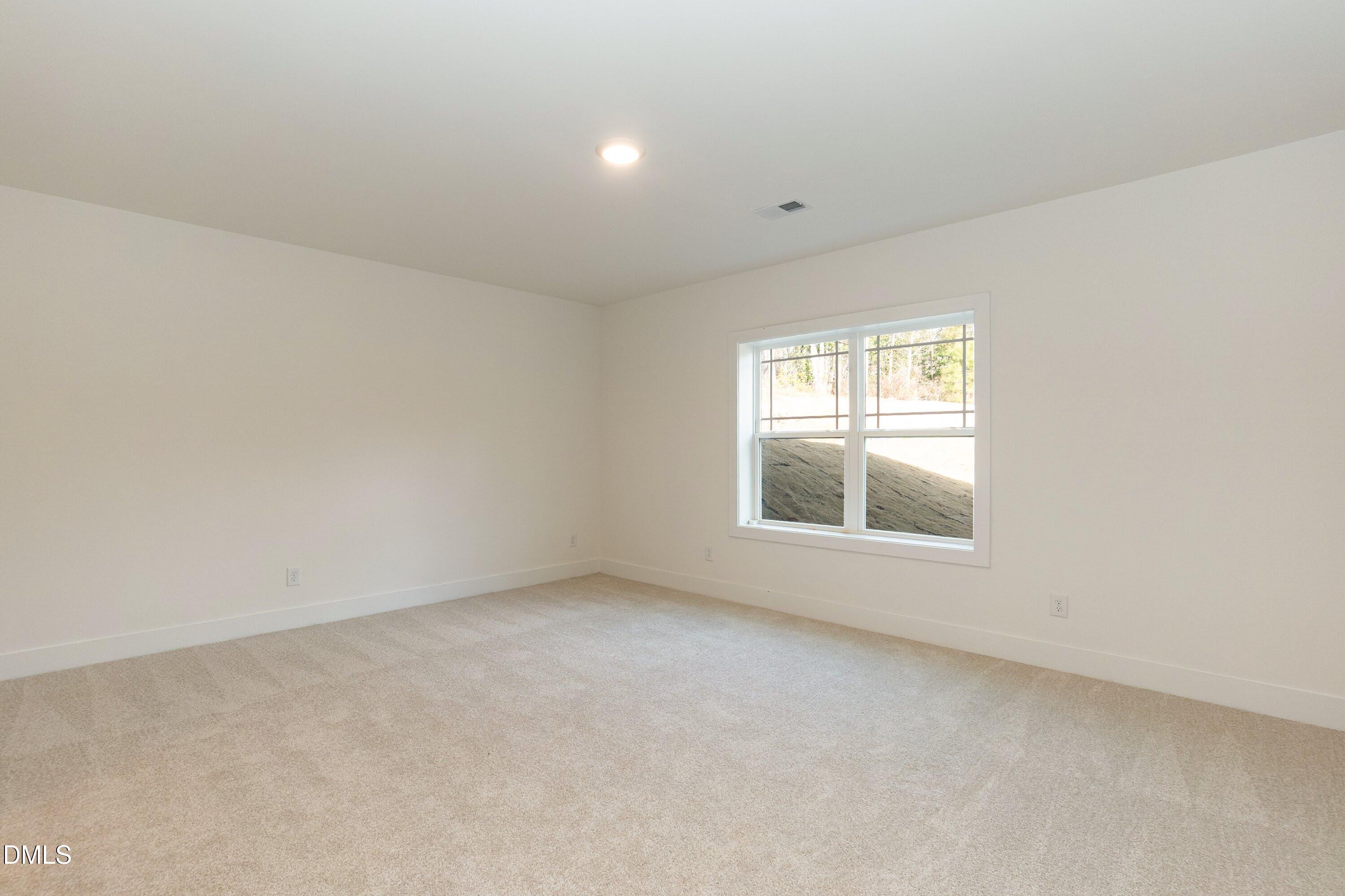42 Braddock Court Garner, NC 27529 - Photo 41 of 56 an empty room with a window