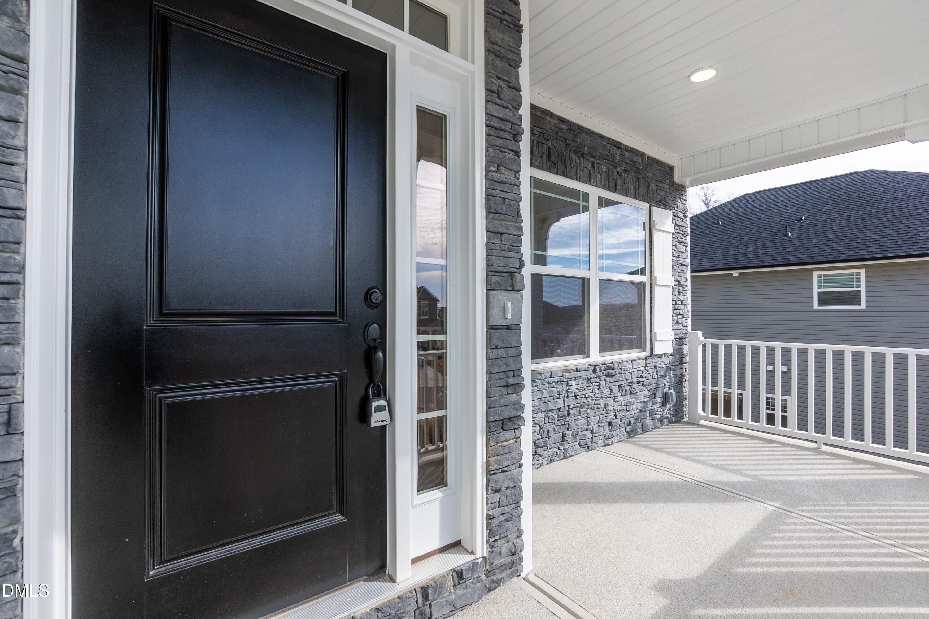 42 Braddock Court Garner, NC 27529 - Photo 6 of 56 a view of entrance door of a house