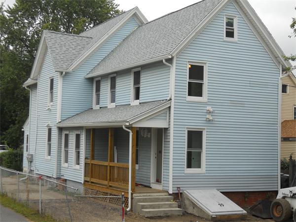 19 Ashley Street Springfield, MA 01105 - Photo 1 of 1 a front view of a house with a yard